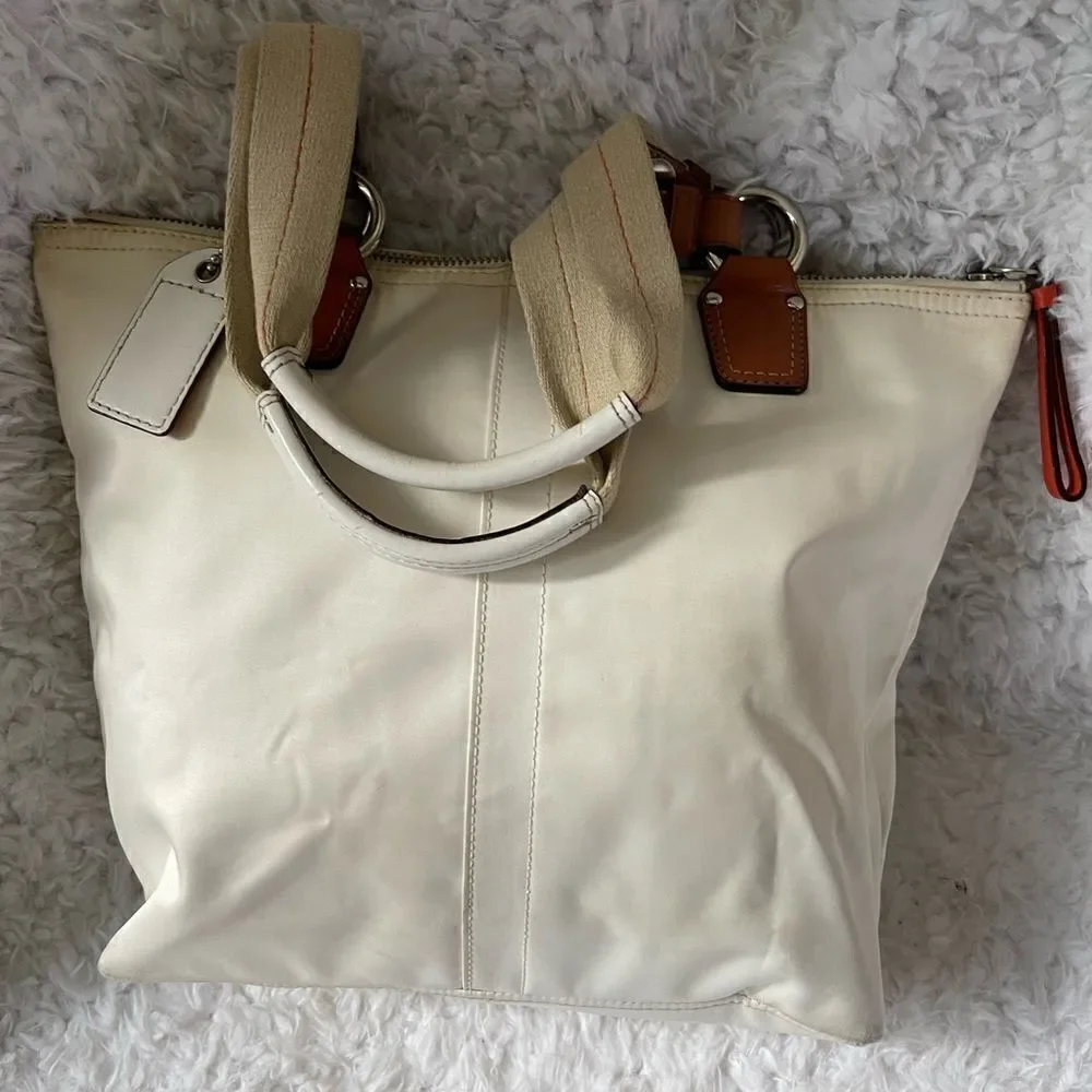 Coach Hampton Beige satin and orange accents satchel with silver tone hardwares